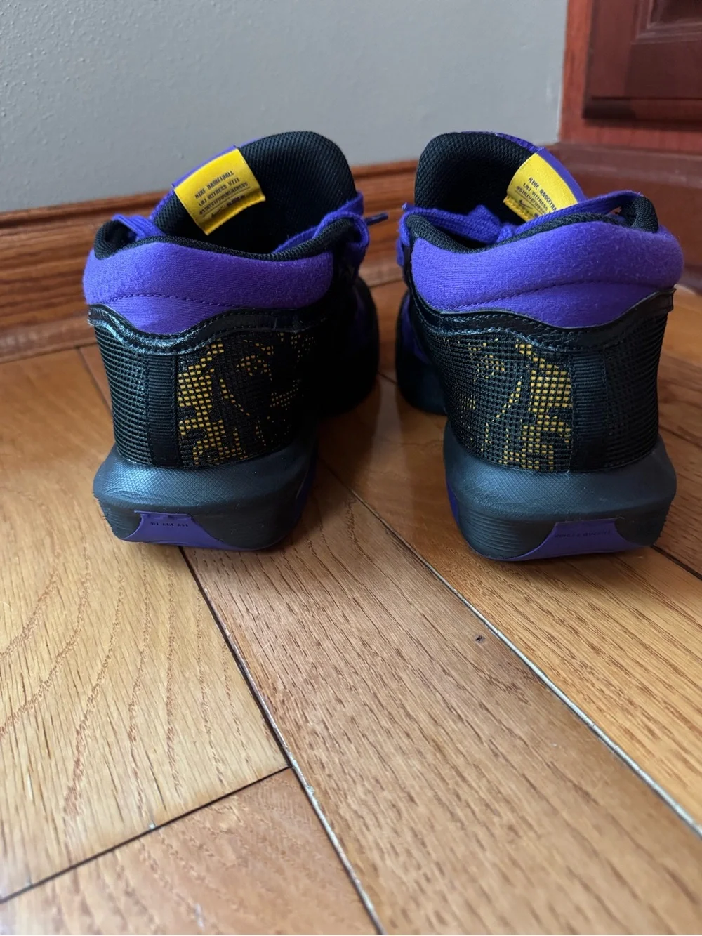 Nike Kids Black and Purple High-Top Sneakers with Yellow Accents